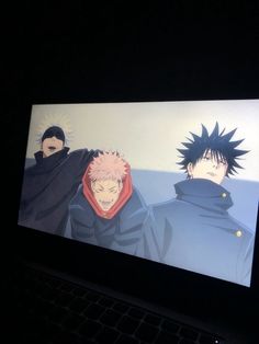 an image of two anime characters on a computer screen with the keyboard in front of them