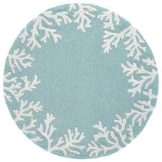 a blue rug with white snowflakes on it