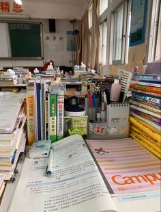 an open book sitting on top of a desk