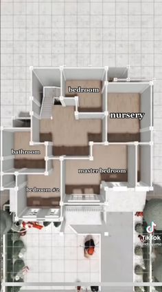 an aerial view of the floor plan of a house with three rooms and two bathrooms