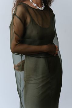 The Organza Dress is crafted from 100% silk and features, piping details throughout, side slits at the bottom, and a boxy fit. 
Please note this is a sheer style as intended. We love to layer it with The Jersey Slip Dress for coverage. 
Made in Los Angeles Silk Overlay Dress, Sheer Silk Dress, Sheer Dress Outfit, Insect Dress, Organza Outfit, Organza Fashion, Sheer Overlay Dress, Dress Layering, Changing Clothes