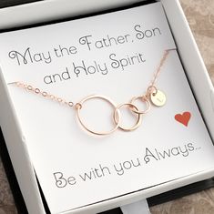 "❤️ Three Circle Necklace - Christian Graduation Necklace in Silver, Gold or Rose Gold ❤️ * Comes with a 2\" extender (for the PERFECT fit when giving) * Solid sterling 925 silver half-hammered circles with silver, gold or rose gold finish * Includes the \"May the Father, Son and Holy Spirit Be with you Always\" mounting card (in first photo) * Chains are flat finished to catch the light -- and sparkle * Comes in a nice gift box -- so you can send directly to your loved one * The perfect first communion or confirmation gift ❤️ H O W ∙ T O ∙ O R D E R ❤️ INITIALS: Let us know in the PERSONALIZATION field * Enter the initial you'd like hand-stamped on the included initial disc (if none, say None) * Need more than one initial? Purchase the number of initials you'd like using the Style dropdow Father Son And Holy Spirit, Photo Chain, Necklace Christian, Christian Necklace, Graduation Necklace, Graduation Gifts For Her, Personalized Graduation Gifts, Bee Necklace, Confirmation Gifts