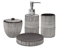 a bathroom set consisting of soap dispenser, toothbrush holder and toilet brush