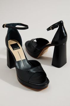 PANDRO is the epitome of platform perfection. This chunky heel channels '90s nostalgia, effortlessly elevating mini dresses and wide-leg trousers. 90s Heels, Football Dress, Football Tops, Shoes Sandals Heels, Chunky High Heels, 90s Nostalgia, Heels & Wedges, Altar'd State, Mini Dresses