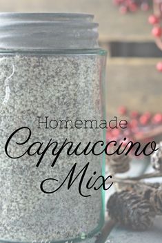 homemade cappuccino mix in a mason jar with pine cones and cinnamons