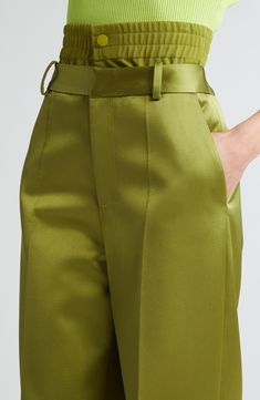 Smooth, satiny pants feature an inner elastic waist plus a classic tailored waistband for a stacked effect on these stunning pants cut with wide flared legs. 34 1/2" inseam; 29" leg opening; 13" front rise; 14 1/2" back rise (size 4) Elastic waist with snap closure; zip fly with hook-and-bar closure Front slant pockets; back welt pocket 91% polyester, 5% elastane, 4% polyurethane Dry clean Made in the USA Designer Clothing Elegant Wide Leg Satin Pants For Formal Occasions, Luxury Satin Pants For Workwear, Formal Satin High-waisted Wide Leg Pants, Luxury Satin Pants For Work, Elegant High-waisted Satin Bottoms, Elegant Satin Wide Leg Pants For Formal Occasions, Luxury Satin Bottoms For Evening, Classic Silk Wide Leg Pants For Evening, Formal Silk Wide Leg Pants With Pressed Crease