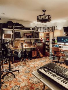 a room filled with lots of musical equipment