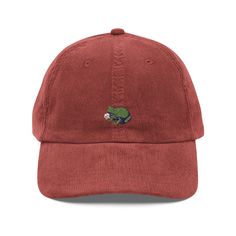 Step up your style with an embroidered old-school cap. It's crafted from 100% cotton corduroy that's soft to the touch and comfy to wear. It features an adjustable strap with a gold-colored buckle for a great fit and a visor to protect you from the sun and wind. Complete your look with this embroidered corduroy cap and rock a cool vibe all day long. * 100% cotton corduroy * Unstructured, 6-panel, low-profile * Cotton twill sweatband and taping * 6 embroidered eyelets * Adjustable strap with a gold-colored metal buckle * Head circumference: 20″-22″ (50.8 cm-56 cm) This product is made especially for you as soon as you place an order, which is why it takes us a bit longer to deliver it to you. Making products on demand instead of in bulk helps reduce overproduction, so thank you for making t Casual Corduroy Baseball Cap With Curved Bill, Adjustable Corduroy Baseball Cap For Streetwear, Casual Corduroy Hat With Curved Bill, Casual Corduroy Snapback Baseball Cap, Casual Adjustable Corduroy Trucker Hat, Casual Corduroy Baseball Cap For Streetwear, Casual Corduroy Dad Hat With Flat Bill, Corduroy Baseball Cap With Curved Brim, One Size, Corduroy Baseball Cap With Embroidered Logo