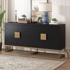 a black and gold sideboard in a living room