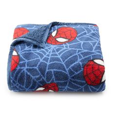 a blue blanket with spiderman on it