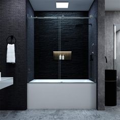 a black and white bathroom with gold accents