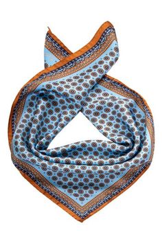 The rich medallion pattern  will transport you to the cobblestone streets of Italy, while the luxurious silk feels sumptuously smooth against your neck. The classic neckerchief size: Approx. 27" x 27". A comfortably large size that fits most men, unlike smaller bandanas. 100% silk twill: A soft, silky fabric traditionally used in men's tailoring for its look and its drape. Characterized by a diagonal weave which makes it very durable. Hand rolled hems: For the ultimate in luxury and sophisticati Mens Silk Bandana, Luxury Silk Scarf For Men, Luxury Blue Silk Scarf For Summer, Elegant Blue Scarf With Bandana Print, Streets Of Italy, Luxury Blue Silk Scarf For Men, Italy Street, Blue Hand-dyed Silk Scarf For Summer, Cobblestone Streets