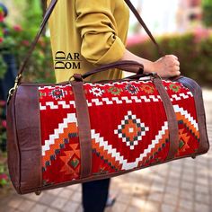 "Leather bag Vintage Leather bag Handmade bag Brown bag ## Product Characteristics ## -Material: Full-grain leather 100% natural and berber fabric -100% Handmade -------------------Small: [L(15\")* H(7\") * W (8\")] [38 cm L* 20 cm H * 20 cm W ] ---------------- Medium: [L(18\")* H(9\") * W (8.20\")] [45 cm L* 23 cm H * 21 cm W ] ----------------- Large: L(21.6\")x H(11\")x W(10\") [L(55)cm x H(28)cm x W(27)cm]  🔴 Discover the perfect companion for your adventures with our handmade leather and Berber fabric travel sport duffel bag. This unique blend of craftsmanship and cultural heritage is meticulously crafted to exude style, functionality, and individuality. With its spacious compartments,  and ergonomic design, this bag is a must-have for travelers and sports enthusiasts alike. Own a o Leather Bag Handmade, Leather Duffel Bag, Kilim Bag, Leather Duffel, Moroccan Leather, Leather Duffle Bag, Vintage Leather Bag, Leather Travel Bag, Leather Duffle