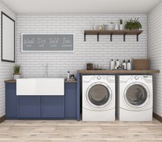 a washer and dryer in a laundry room with white brick walls, wood flooring and blue cabinets