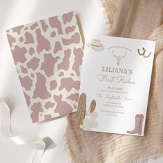 a pink and white baby shower is next to a card that says, lilanna's first rodeo