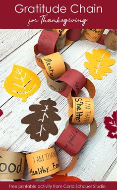 a paper chain with words on it that say, i am thanksgiving and have leaves cut out