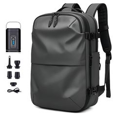 an image of a back pack with charger and usb cable plugs attached to it