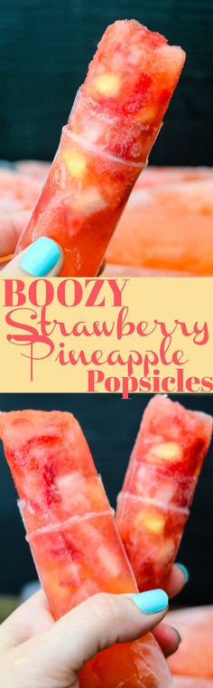 a person holding up some fruit in their hand with the words boozy strawberry pineapple pops