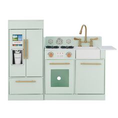 a toy kitchen with an oven, sink and refrigerator in mint green painted wooden cabinets