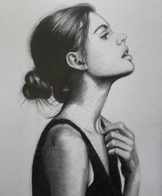 a black and white drawing of a woman's profile