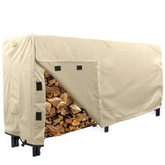 a firewood log rack with a cover over it