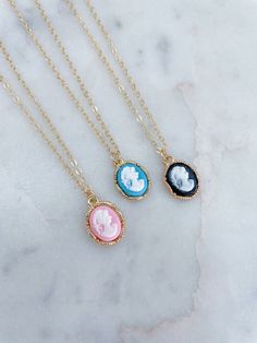 Cameo Necklace Gold, Cameo Jewelry, Cameo Pendant Necklace, Gold Cameo, Cameo Choker, Old Fashioned Jewelry, Pink Cameo, Black Cameo, Blue Gorgeous 15mm X 10mm cameo necklace on a 14k gold filled chain with 14k gold filled jumprings and clasp. Giftbox included. Choose from pink, black, or blue. Cameo Choker, Black Cameo, Cameo Pendant Necklace, Pendant Necklace Gold, Cameo Jewelry, Cameo Necklace, Cameo Pendant, Gold Filled Chain, Necklace Gold