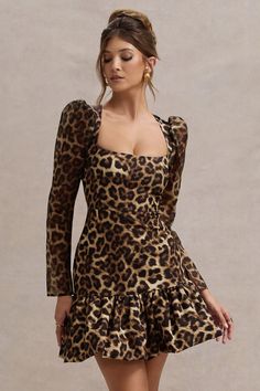 Expertly crafted in a new season silhouette, every party girl needs a mini like Ombra. Designed in our premium stretch crepe and semi-sheer georgette, this leopard print mini dress is defined by a sculpting square neckline, long puff sleeves and ruffled hemline. With so many elevated details, keep Ombra at the forefront of your event by styling yours with a simple tousled bun and gold accents.Features - Premium stretch crepe- Square neckline - Long sheer sleeves- Invisible zip closure - Ruffled hemline - Mini length Sizing & Fit Model is 5'7 and wears UK size 8 / US size 4 Product Information Designed exclusively by Club L London Lined with some stretch Premium crepe & georgette in Leopard Print (92% Polyester, 8% Elastane) 85cm total length SKU: CL134961018 Elegant Mini Dress, Cheetah Dress, Deep Autumn, Black Dress Prom, Black Tie Gala, Party Dress Long Sleeve, Bridesmaid Outfit, Girl Needs, Black Sequin Dress