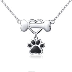 a dog's paw and heart shaped bone necklace