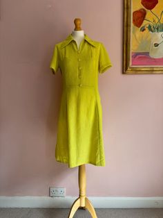 Classic late 60s  dress - homemade and easy to wear, easy to clean, non iron fabric of the period - crimpolene! Side zip opening. note: there is a small black mark on the side of the dress - not that noticeable  Chest 36" Waist 32" Length 38" Yellow A-line Vintage Dress For Summer, Yellow Vintage A-line Dress For Spring, Yellow Vintage Short Sleeve Dress For Spring, Yellow Short Sleeve Vintage Dress For Spring, Yellow A-line Vintage Dress For Spring, Spring Yellow A-line Vintage Dress, Yellow Fitted Dress In 1950s Style, Fitted Yellow Dress In 1950s Style, 1970s Style Yellow Spring Dress