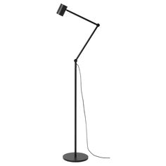 a black floor lamp on a white background