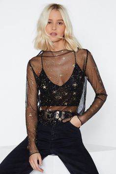 Count your stars. This top comes in mesh and features a high neckline and gold star detailing throughout. Looks Black, Mode Inspo, Rave Outfits, Edgy Outfits, Ladies Dress Design, Black Outfit