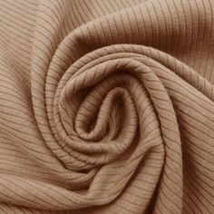 a close up view of the fabric on a white shirting material that is very soft