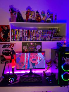 a desktop computer sitting on top of a desk in front of a book shelf filled with books