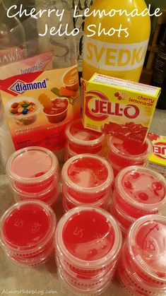 the ingredients to make cherry lemonade jello shots are displayed on a counter top