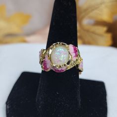 Beautiful Opal And Pink Floral Ring Pink Flower Enamel Ring For Wedding, Adjustable Pink Opal Ring, Adjustable Pink Round Opal Ring, Adjustable Pink Opal Ring As A Gift, Pink Enamel Ring As A Gift, Pink Flower Enamel Ring For Gift, Adjustable Pink Ring For Anniversary, Adjustable Pink Oval Jewelry, Adjustable Oval Pink Jewelry