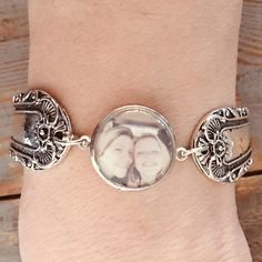 "This is a listing for one custom silver spoon bracelet with 1 photo snap interchangeable charms. 11/16\" circle photo charms (18mm), 1 included, snap on and off easily 3/4\" wide boho spoon bracelet silver bangle bracelet with magnetic clasp for easy on and off, 7.5 inch around I will make this to order for you. Have favorite pictures of a loved one, pet, friend, or saying? It can go on this charm! They are one sided resin sealed charms. I can switch these out to the 12mm upon request. You will Adjustable Silver Bracelet With Round Pendant, Silver Cabochon Bracelets For Gift, Silver Bracelets With Cabochon For Gift, Antique Silver Round Bracelets For Gift, Antique Silver Round Bracelet For Gift, Nickel-free Silver Cuff Bracelet, Antique Silver Round Cuff Bracelet Gift, Silver Cabochon Cuff Bracelet Gift, Antique Silver Round Cuff Bracelet As Gift