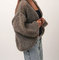 Mohair Cardigan, Chunky Knit Cardigan, Slouchy Fluffy Cardigan, Women Mohair Merino Wool Cardigan. The hand knit mohair merino cardigan is made of Italian premium quality Kid Mohair. A luxury yarn made out of 80% kid mohair; 10% Lana merino extra fine; 10% Polyamide. Very light and fluffy feeling, like floating on clouds. The mohair merino cardigan is cuddly soft, no itching. Perfect for casual, dating, office and going out.  Designed to flatter all silhouettes with its wide oversized fit. Perfe Winter Mohair Cardigan, Winter Mohair Cardigan With Soft Texture, Mohair Cardigan With Soft Texture For Winter, Cozy Mohair Knitted Cardigan, Cozy Knitted Mohair Cardigan, Cozy Mohair Soft Knit Outerwear, Mohair Chunky Knit Cardigan For Fall, Cozy Mohair Knitted Outerwear, Cozy Mohair Cardigan