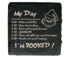 a stone sign that says, my day i'm hooked up to the cat in the hat