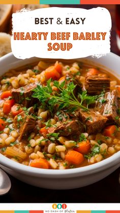 a bowl of hearty beef barley soup with carrots and parsley