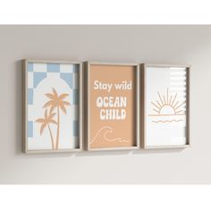 three framed pictures hanging on the wall with words and palm trees in different shapes, sizes and colors