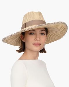 When shopping for a special occasion hat for sale online, Caroline, an elegant wide-brim fedora, will make an impression. It is suitable to wear for a wedding, Kentucky Derby, or an outdoor luncheon. This ever-chic style is made entirely of Squishee®, our unique man-made material, resembling natural raffia, which incorporates recycled fibers. The profile brim is wired beneath the narrow self-fringed edge, sweeping up on one side and gently sloping down on the other, to dramatic effect. A cotton Caroline White, Special Occasion Hats, Cute Summer Outfit, Hat Wide Brim, Cotton Ribbon, Wide Brim Fedora, Cute Summer Outfits, Hats For Sale, Fedora Hat