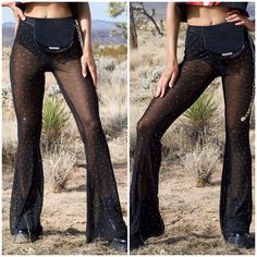 Our Show Some Flare Mesh Pants Add The Perfect Touch To Our Festival Outfits. These Pants Feature Shimmering Rhinestones And Flared Bottoms. These Pants Have Everything We Could Ask For! Pair With A Chic Bandeau Top And Your Favorite Shoes For A Must Have Look! Black Color Rhinestones Mesh Flare Bottoms Questions? Or Need Additional Measurements? Tags: Coachella Stagecoach Crochet Lace Festival Burning Man Snowglobe Rave Summer Corduroy Distressed Rock N Roll Trendy Bohemian Boho Girly Sequin Sh Black Embellished Wide Leg Bottoms, High Waist Embellished Evening Bottoms, Embellished High Waist Evening Bottoms, Glamorous Black Embellished Bottoms, Glamorous Embellished Black Bottoms, Embellished Trousers For Night Out, Glamorous Fitted Pants With Rhinestones, Fitted Black Embellished Pants, Fitted Embellished Black Pants