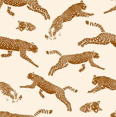 leopards and cheetah are depicted in this brown and white pattern on a beige background