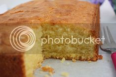 a piece of cake sitting on top of a table next to a fork