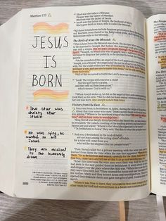 an open bible with the words jesus is born on it