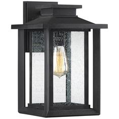 Working with a modified lantern silhouette, this modern industrial outdoor wall light offers a classy addition to exterior structures. Embrace a boxy profile on a sophisticated light fashioned of earth black finish plastic with clear seedy glass panels. A tiered roof embellishes its tasteful design. This light from the Wakefield collection by Quoizel becomes an integral part of outdoor accenting. Frame Within A Frame, Arts And Crafts Design, Transitional Coastal, Black Outdoor Wall Lights, Quoizel Lighting, Art And Craft Design, Outdoor Wall Lantern, Wakefield, Wall Lantern