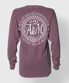 This longsleeve faded maroon Comfort Colors shirt has a A&M monogram circle on the back with the text "Texas Aggie Football, Fightin' Texas Aggies" The front has a pocket with a block ATM. 100% Cotton. Aggie Football, Texas Football, Sleeve Ideas, Cheer Shirts, College Shirts, Spirit Shirts, Spirit Wear