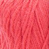 the yarn is bright pink and it looks like something out of an old knitting book