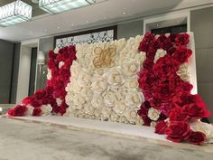 a large floral arrangement with red and white flowers