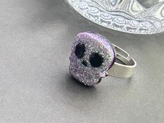 Looking for scary jewelry to wear during the Halloween holiday or any time of year?  The gothic skull charm adheres onto an adjustable silver plated ring.  The skull charm is about 15x 15mm. Fits most sizes. ♥ See more Halloween jewelry here: https://www.etsy.com/shop/iceblues/items?ref=listing-shop-header-item-count&search_query=halloween GIFTS Each item is individually wrapped in a branded jewelry gift box. We do not include price receipts in the package. We are happy to ship directly to the recipient. EXPEDITED SHIPPING At checkout, you have the option to choose faster shipping in the drop-down menu. Ship times do NOT include production times. However, if you select expedited shipping, we will try to get your order completed faster. SHOP FAQs Please read my shop policies for my current Scary Jewelry, Rings Skull, Halloween Skulls, Halloween Ring, Gothic Skull, Halloween Jewelry, Skull Ring, Plated Ring, Halloween Skull